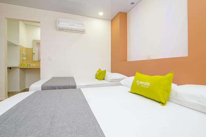 Imagen de la habitación del Hotel Eco Suite Cali. Foto 4
