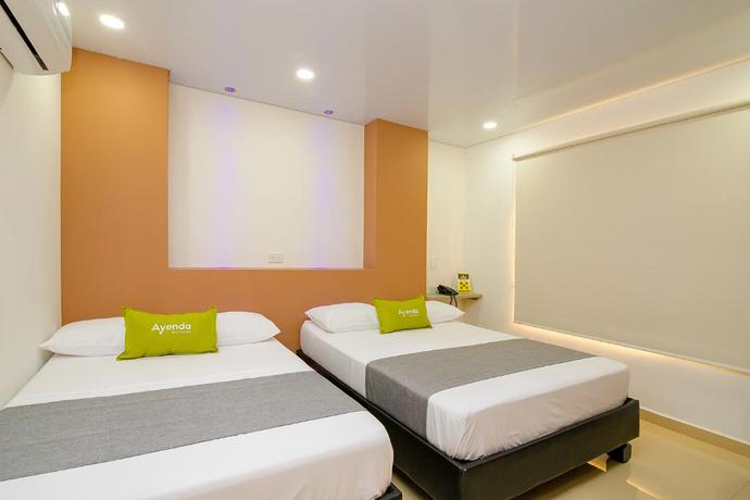 Imagen de la habitación del Hotel Eco Suite Cali. Foto 5