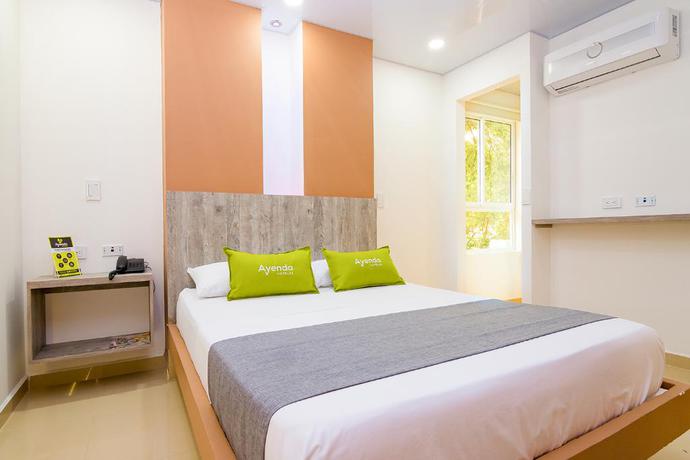 Imagen de la habitación del Hotel Eco Suite Cali. Foto 11