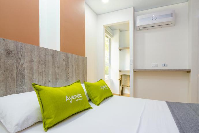 Imagen de la habitación del Hotel Eco Suite Cali. Foto 12