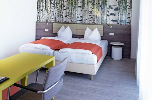 Imagen de la habitación del Hotel Eco Suite, Salzburgo. Foto 3
