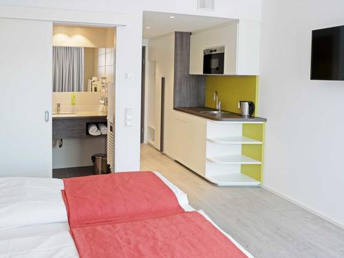 Imagen de la habitación del Hotel Eco Suite, Salzburgo. Foto 6