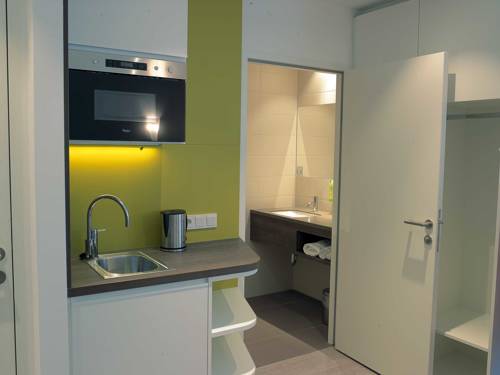 Imagen de la habitación del Hotel Eco Suite, Salzburgo. Foto 8