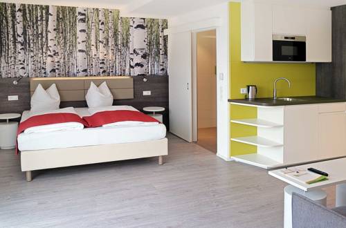 Imagen de la habitación del Hotel Eco Suite, Salzburgo. Foto 10