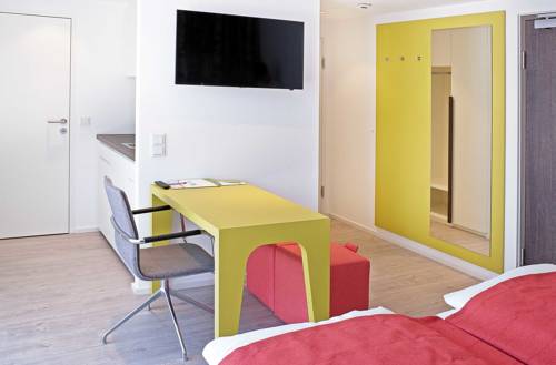 Imagen de la habitación del Hotel Eco Suite, Salzburgo. Foto 11