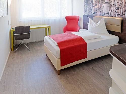 Imagen de la habitación del Hotel Eco Suite, Salzburgo. Foto 12