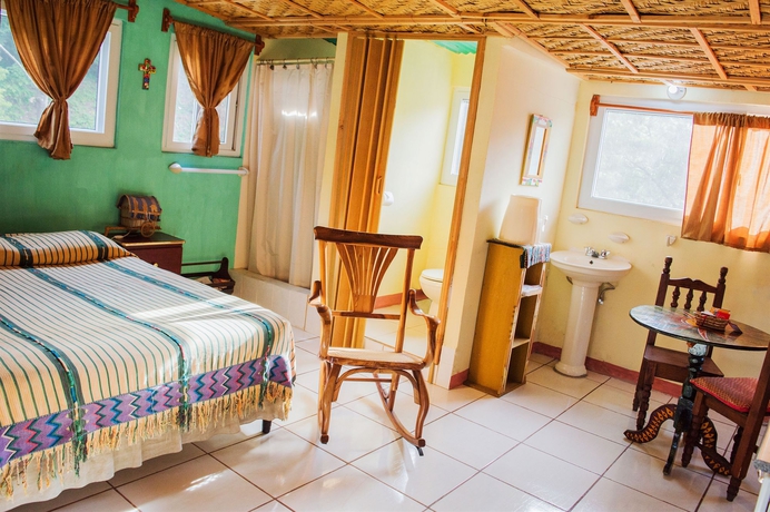 Imagen de la habitación del Hotel Eco Suites Uxlabil Guatemala City. Foto 2