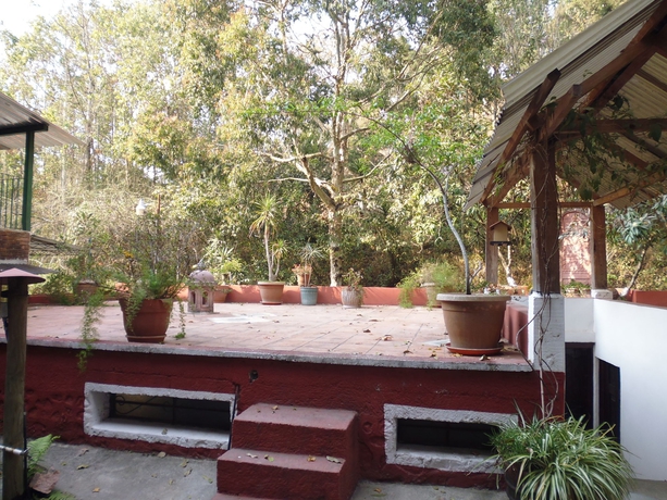 Imagen de los exteriores del Hotel Eco Suites Uxlabil Guatemala City. Foto 7