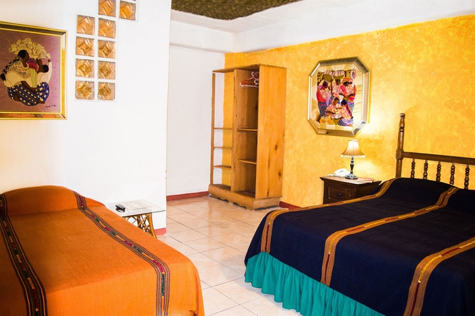 Imagen de la habitación del Hotel Eco Suites Uxlabil Guatemala City. Foto 6