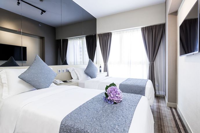 Imagen de la habitación del Hotel Eco Tree Causeway Bay. Foto 2