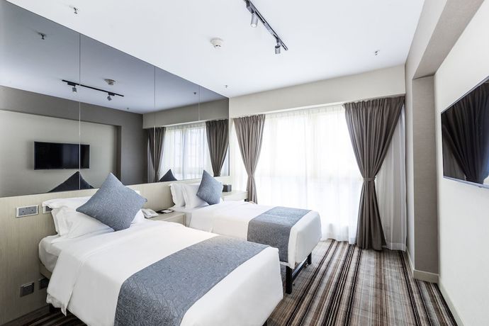 Imagen de la habitación del Hotel Eco Tree Causeway Bay. Foto 6