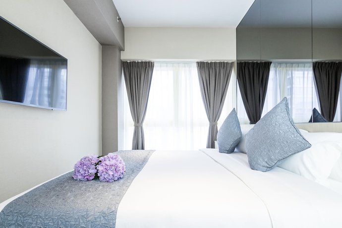 Imagen de la habitación del Hotel Eco Tree Causeway Bay. Foto 7