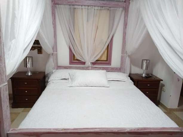 Imagen de la habitación del Hotel Eco Villa Diana. Foto 18