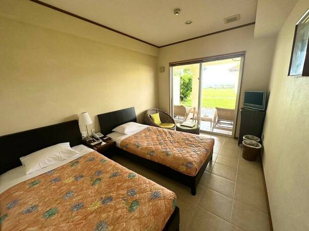 Imagen de la habitación del Hotel Eco Village Iriomote. Foto 16