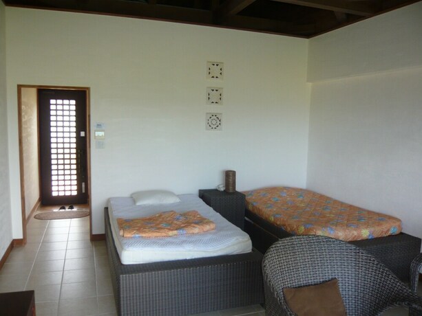 Imagen de la habitación del Hotel Eco Village Iriomote. Foto 33