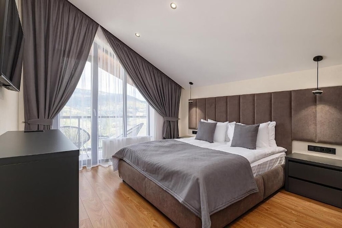 Imagen de la habitación del Hotel EcoBerghaus. Foto 4