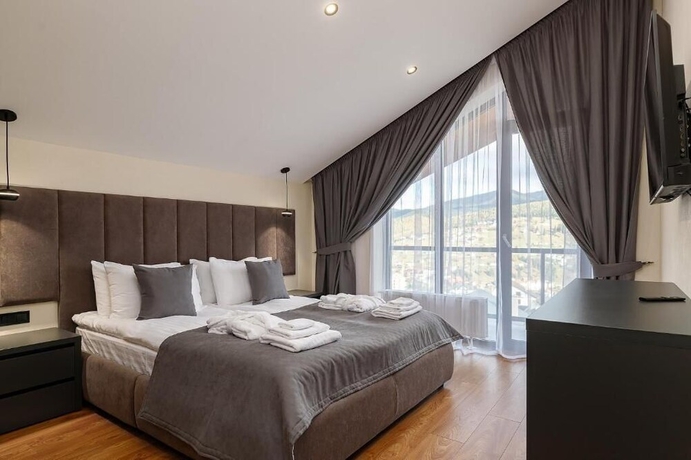 Imagen de la habitación del Hotel EcoBerghaus. Foto 5