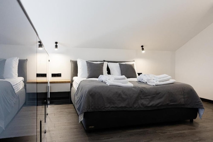 Imagen de la habitación del Hotel EcoBerghaus. Foto 6