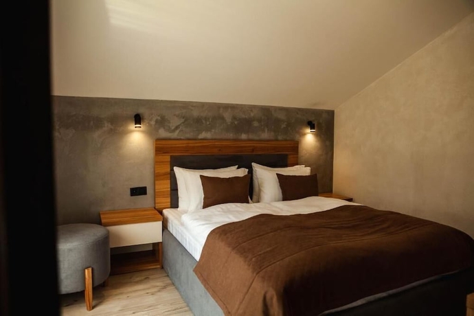 Imagen de la habitación del Hotel EcoBerghaus. Foto 11