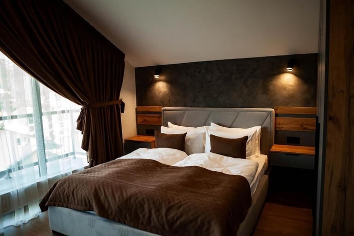 Imagen de la habitación del Hotel EcoBerghaus. Foto 12