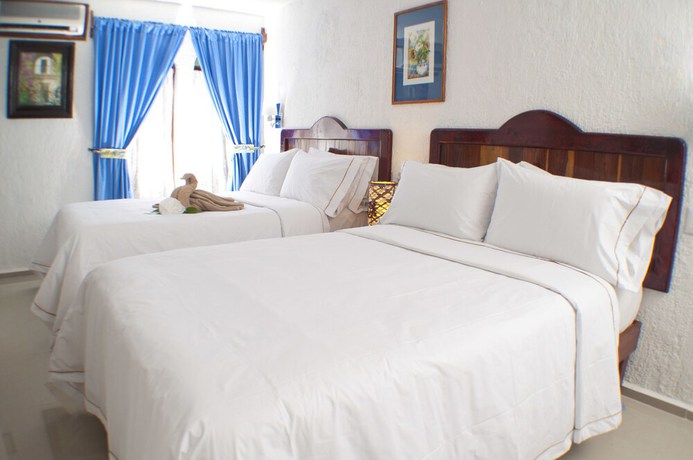 Imagen de la habitación del Hotel Eco-El Rey del Caribe. Foto 7