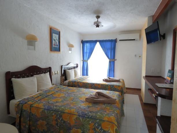 Imagen de la habitación del Hotel Eco-El Rey del Caribe. Foto 9