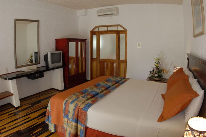 Imagen de la habitación del Hotel Eco-El Rey del Caribe. Foto 15