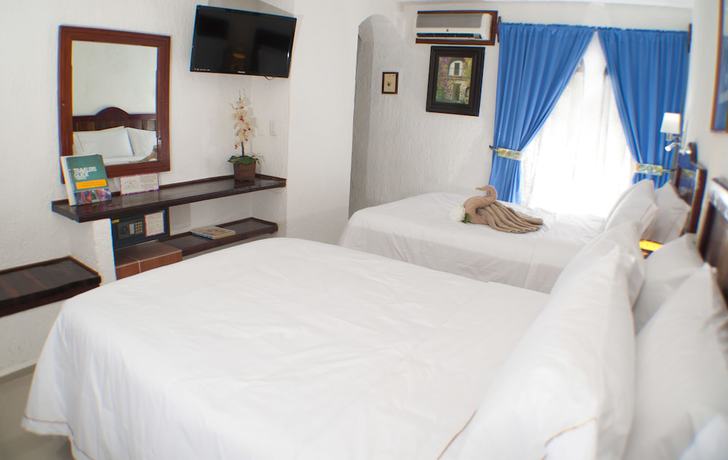 Imagen de la habitación del Hotel Eco-El Rey del Caribe. Foto 18