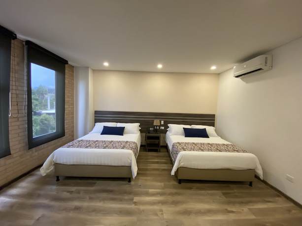 Imagen de la habitación del Hotel EcoHub Hotel Medellin. Foto 7