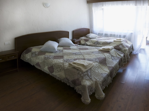 Imagen de la habitación del Hotel EcoRest Likani Palace. Foto 2