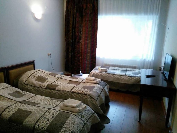 Imagen de la habitación del Hotel EcoRest Likani Palace. Foto 3