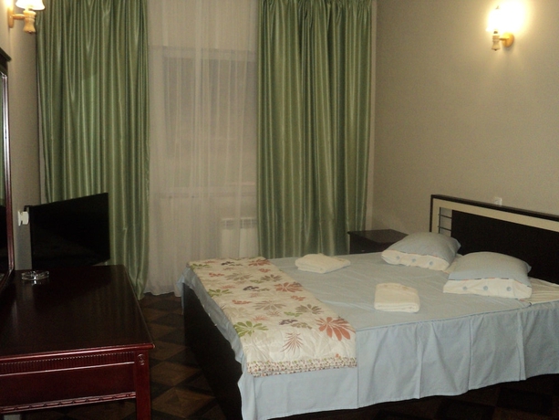 Imagen de la habitación del Hotel EcoRest Likani Palace. Foto 12
