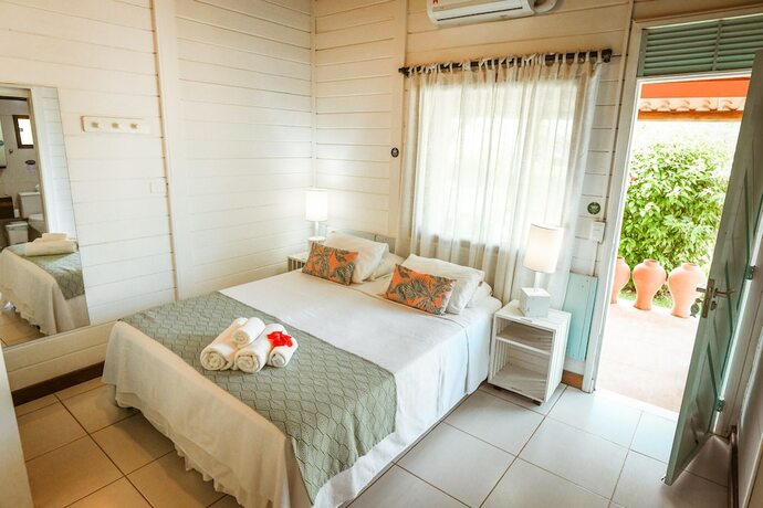 Imagen de la habitación del Hotel Ecocharme Pousada Pedra Do Mar. Foto 18