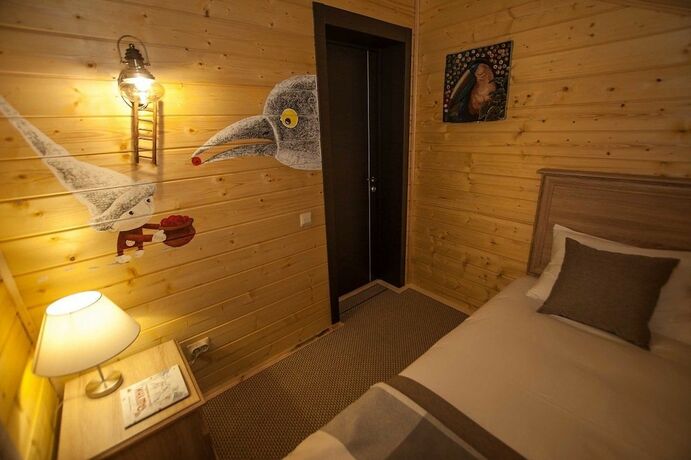 Imagen de la habitación del Hotel Eco-home. Foto 12