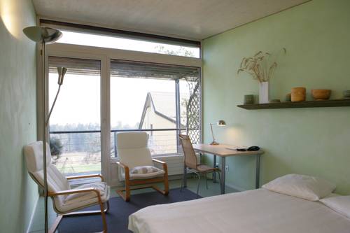 Imagen de la habitación del Hotel Ecohotel L'aubier. Foto 9