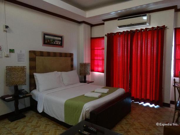 Imagen de la habitación del Hotel Ecoland Suites. Foto 5