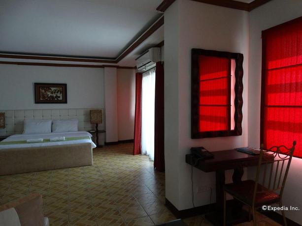 Imagen de la habitación del Hotel Ecoland Suites. Foto 10