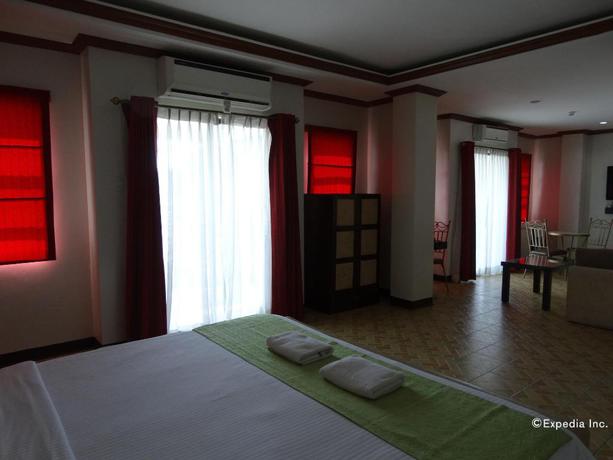Imagen de la habitación del Hotel Ecoland Suites. Foto 12