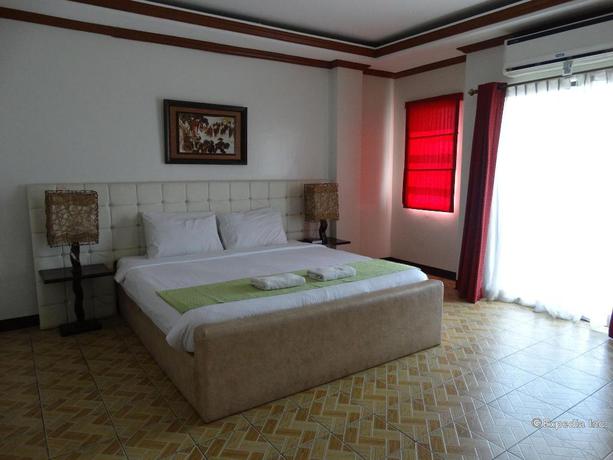 Imagen de la habitación del Hotel Ecoland Suites. Foto 13