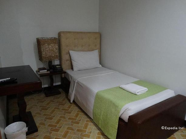 Imagen de la habitación del Hotel Ecoland Suites. Foto 14