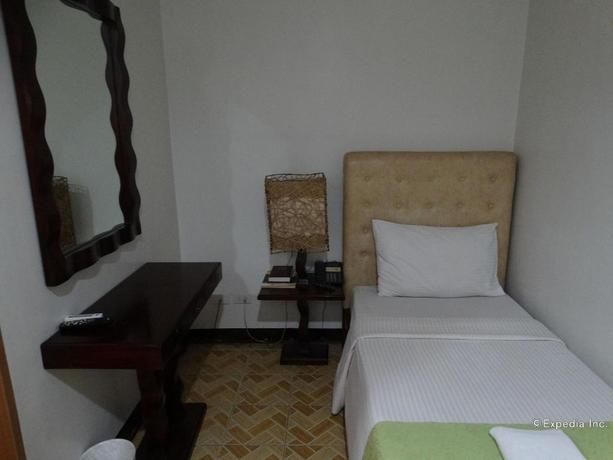 Imagen de la habitación del Hotel Ecoland Suites. Foto 16