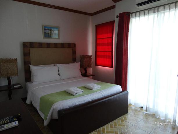 Imagen de la habitación del Hotel Ecoland Suites. Foto 18
