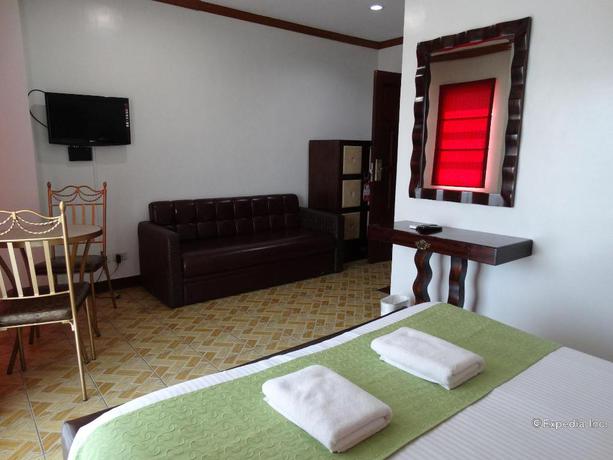 Imagen de la habitación del Hotel Ecoland Suites. Foto 20