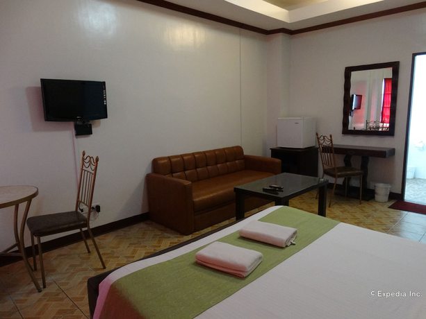 Imagen de la habitación del Hotel Ecoland Suites and Inn. Foto 2