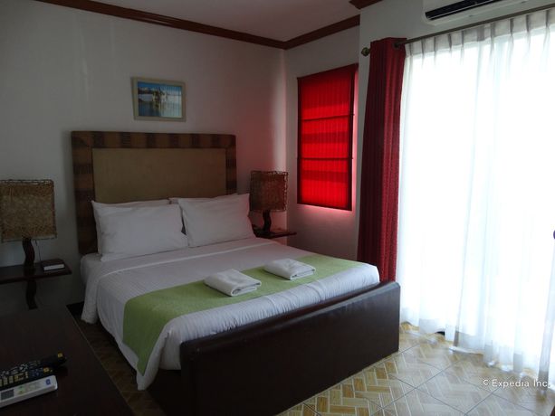 Imagen de la habitación del Hotel Ecoland Suites and Inn. Foto 5