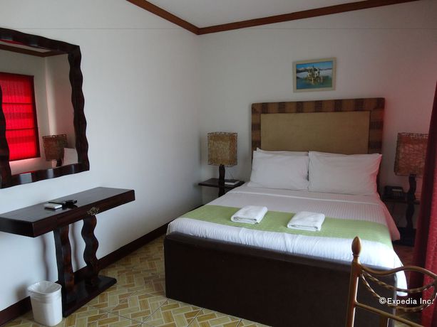 Imagen de la habitación del Hotel Ecoland Suites and Inn. Foto 7