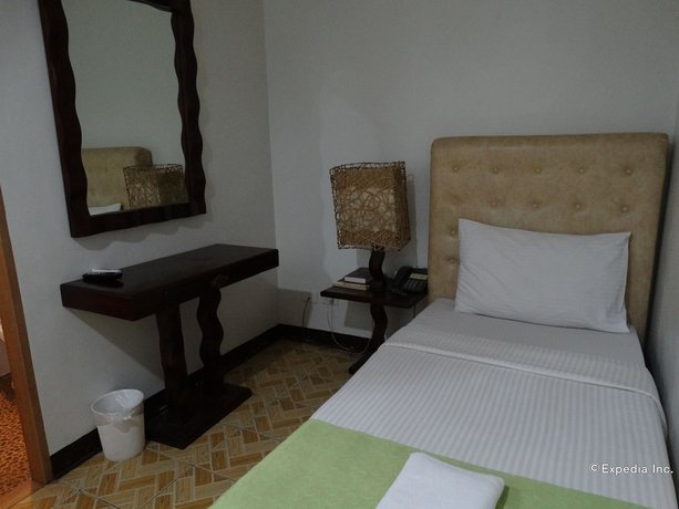 Imagen de la habitación del Hotel Ecoland Suites and Inn. Foto 11