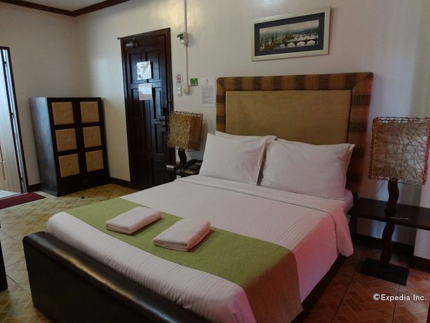 Imagen de la habitación del Hotel Ecoland Suites and Inn. Foto 12