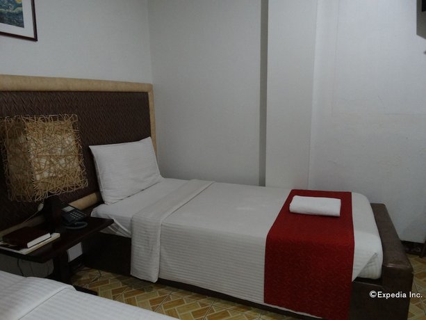 Imagen de la habitación del Hotel Ecoland Suites and Inn. Foto 13