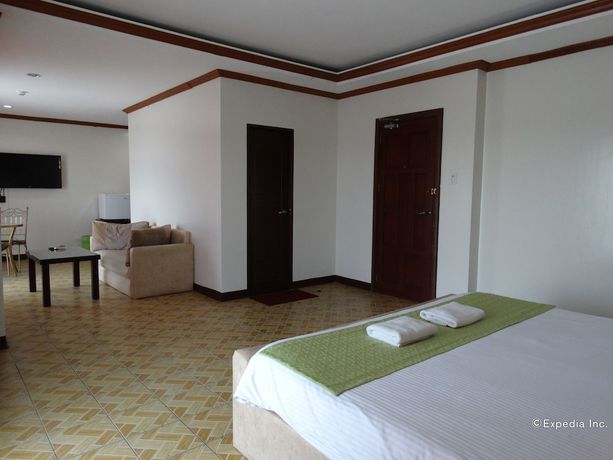 Imagen de la habitación del Hotel Ecoland Suites and Inn. Foto 14